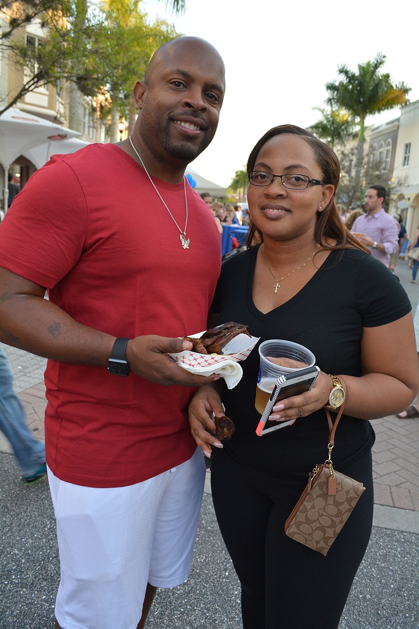Jay and Rhonda Williams walked across the street from their apartment in The Venue for some chicken wings.