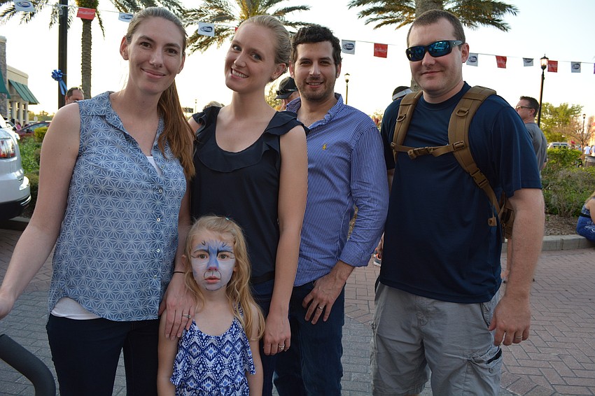 Kristie Geimer, with her 4-year-old daughter, Aria, poses with Ashley and Elliott McCurry, and her husband, John.