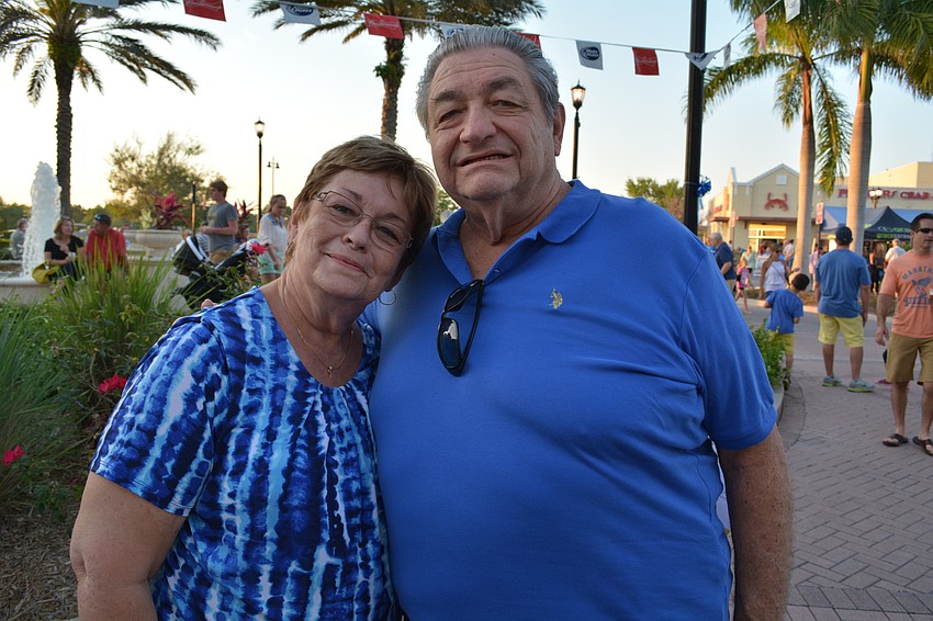 Carol and Dave Thomas dress in blue.