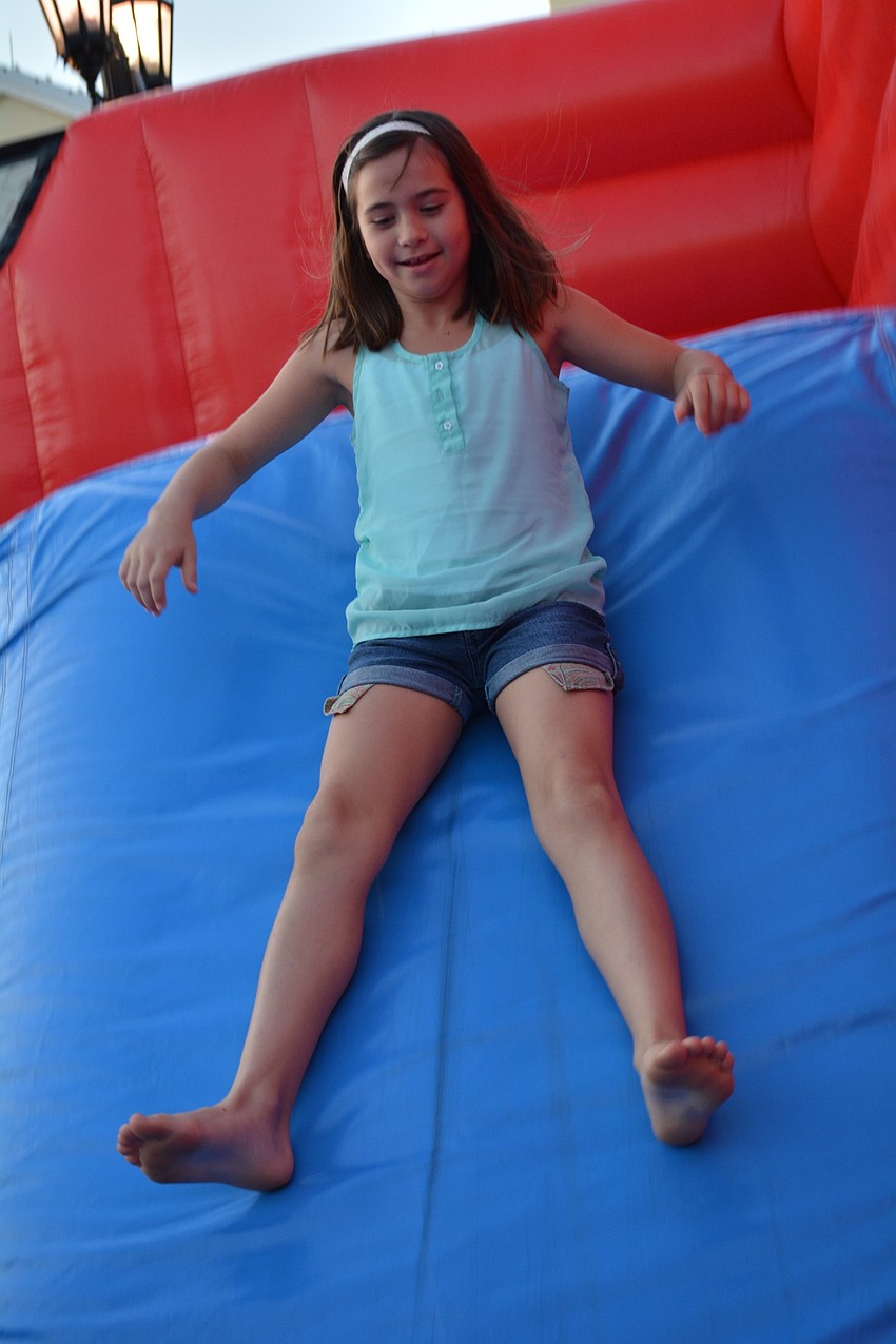 Ava Renda, of Parrish, flies through the obstacle course.