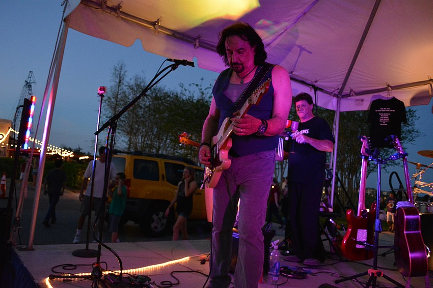 The Distractions provide live music.