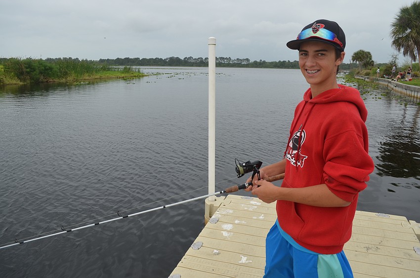 Thirteen-year-old Dylan Nealey, of East County, participates in the children's division of the fishing tournament.