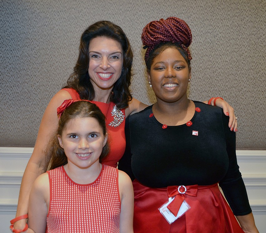 'She Knows Where She's Going' Award Recipient Aimee Cogan with her daughter Bella and Girls Inc. 'Girl of the Year' Tyesha Brown
