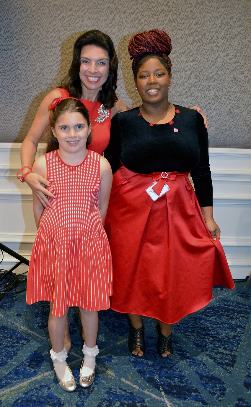 'She Knows Where She's Going' Award Recipient Aimee Cogan with her daughter Bella and Girls Inc. 'Girl of the Year' Tyesha Brown