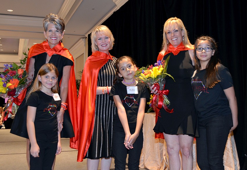 Co-Chairs Sally Schule, Veronica Brady and Susan Malloy Jones with Girls Inc. supergirls