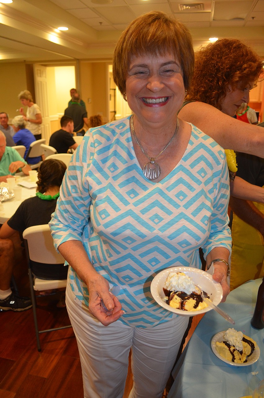 Sandy Willetts finds the dessert table.