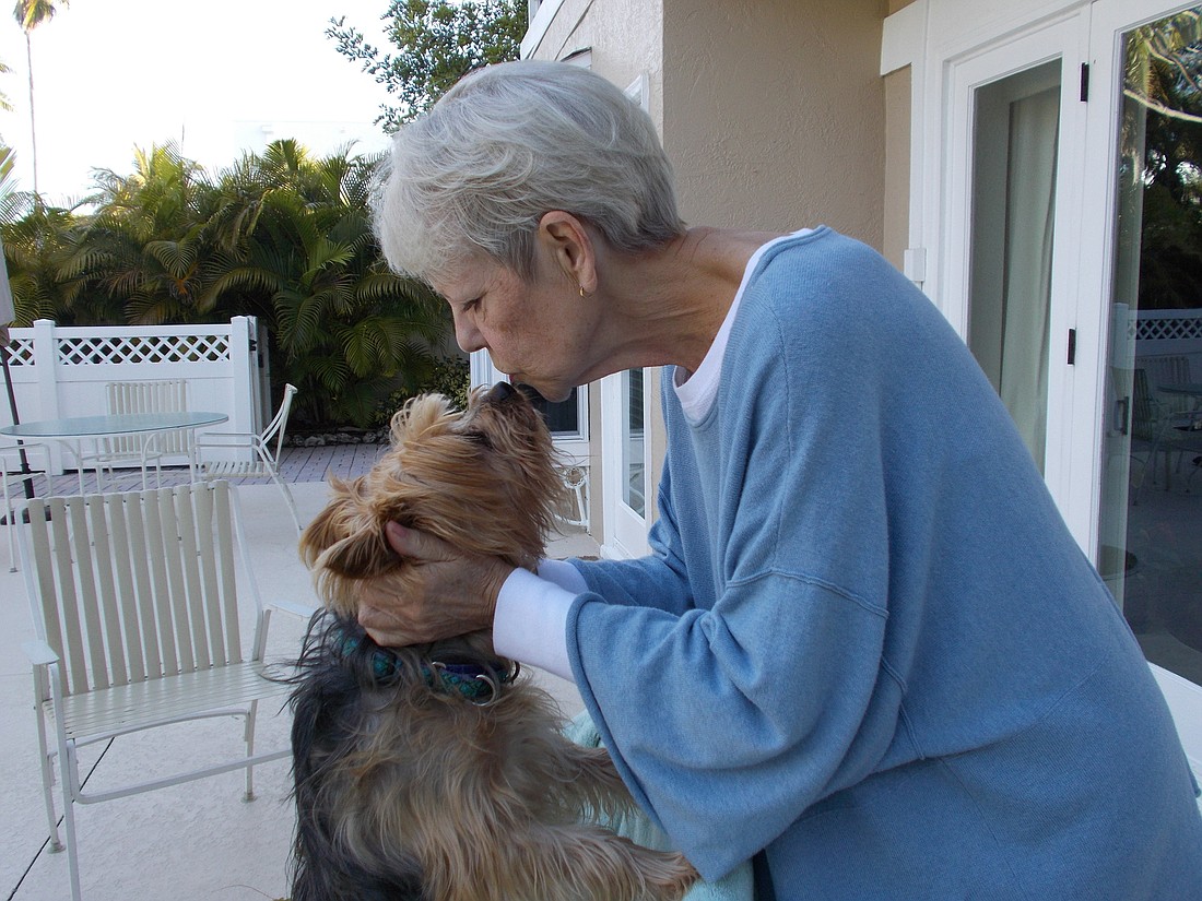 Lifelong animal lover Cee Edmundson with friend Dora Walter's dog, Jake