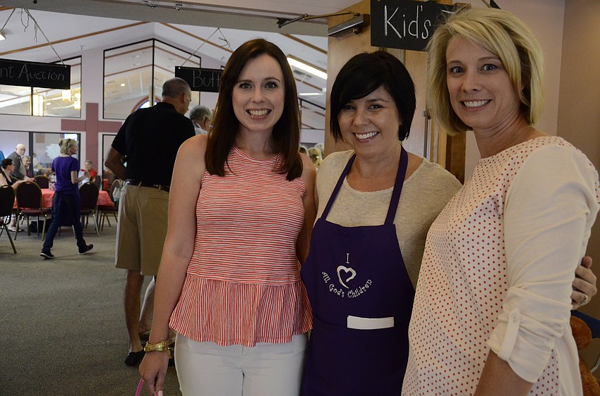 Event co-chairwoman Kelly Holden, Assistant Director Erin Bonifate and event chairwoman Brandy Lemley