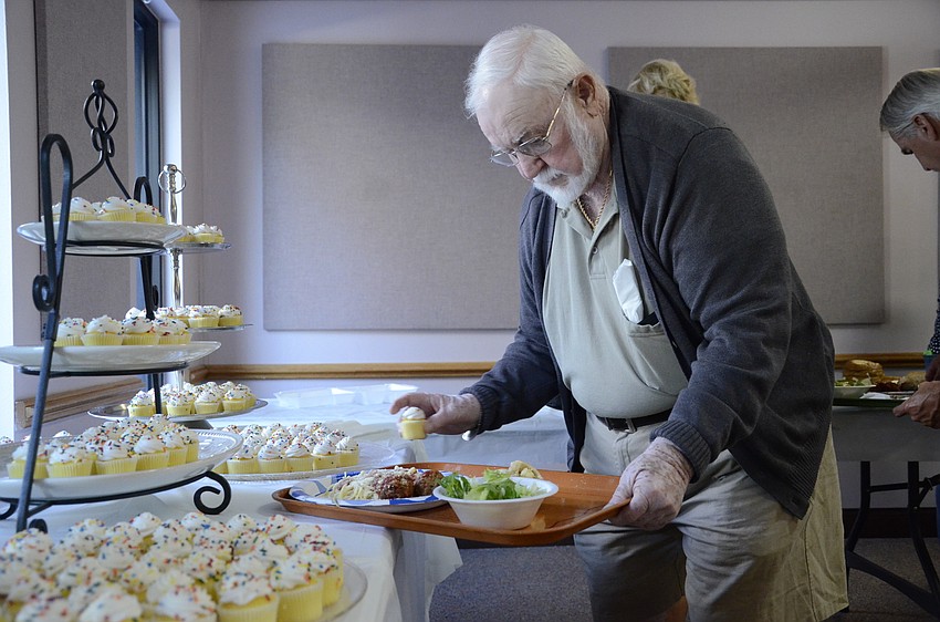 Bob Galey gets a cupcake for dessert.