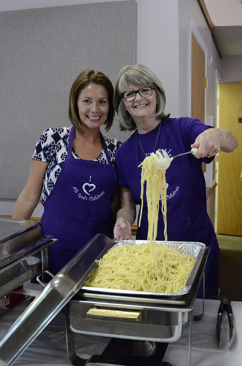 Andrea West and Janice Marmo served noodles to more than 250 people.