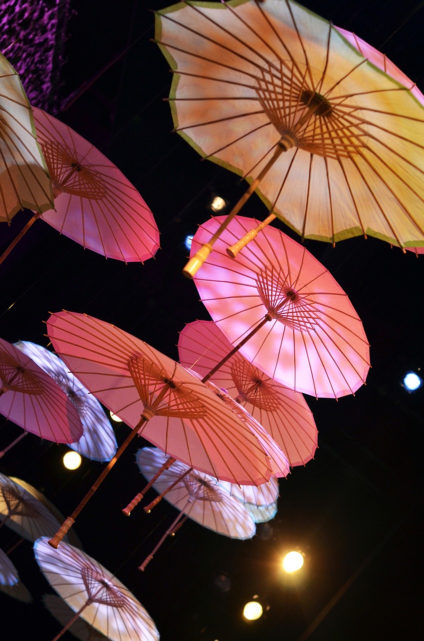 The stage at FSU Center for the Performing Arts was decorated for Asolo Rep's annual Season Celebration on Stage. The decor was themed around a 'rain garden party.'