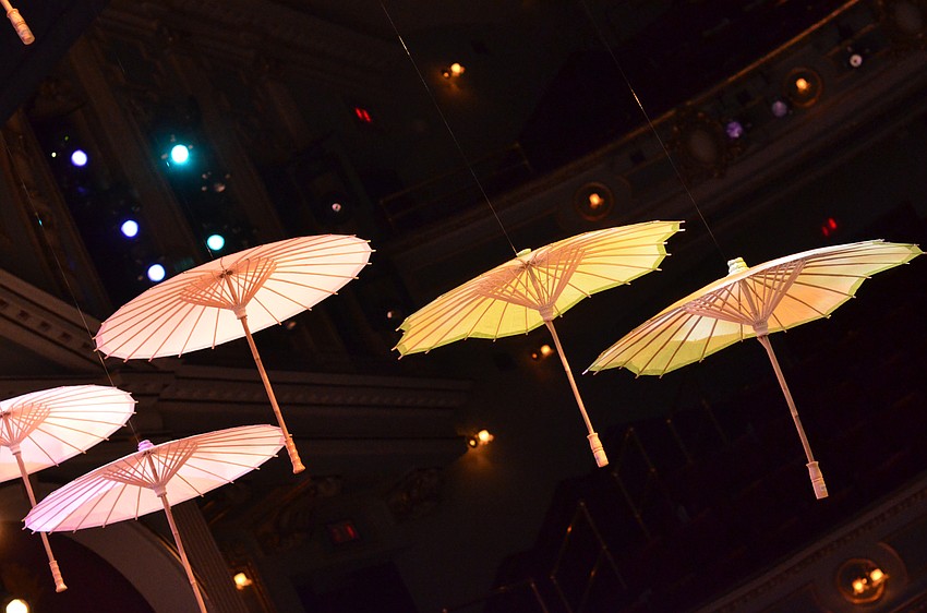 The stage at FSU Center for the Performing Arts was decorated for Asolo Rep's annual Season Celebration on Stage. The decor was themed around a 'rain garden party.'