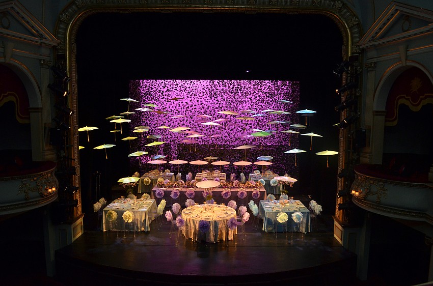 The stage at FSU Center for the Performing Arts was decorated for Asolo Rep's annual Season Celebration on Stage. The decor was themed around a 'rain garden party.'