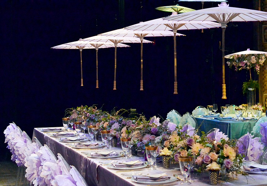 The stage at FSU Center for the Performing Arts was decorated for Asolo Rep's annual Season Celebration on Stage. The decor was themed around a 'rain garden party.'