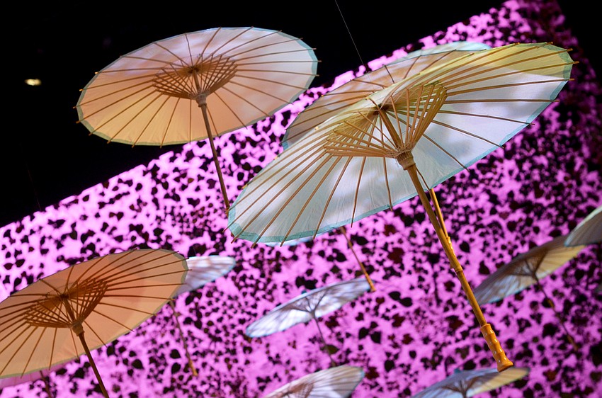 The stage at FSU Center for the Performing Arts was decorated for Asolo Rep's annual Season Celebration on Stage. The decor was themed around a 'rain garden party.'