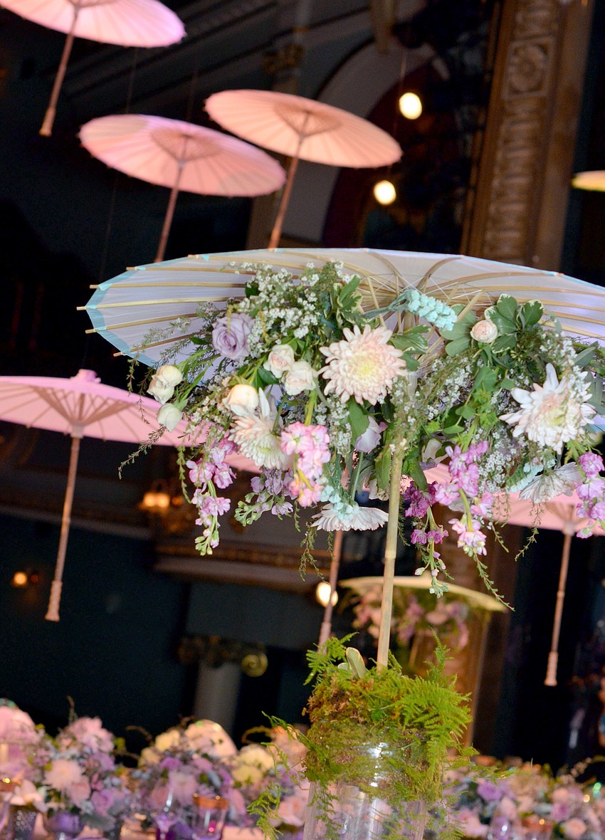 The stage at FSU Center for the Performing Arts was decorated for Asolo Rep's annual Season Celebration on Stage. The decor was themed around a 'rain garden party.'