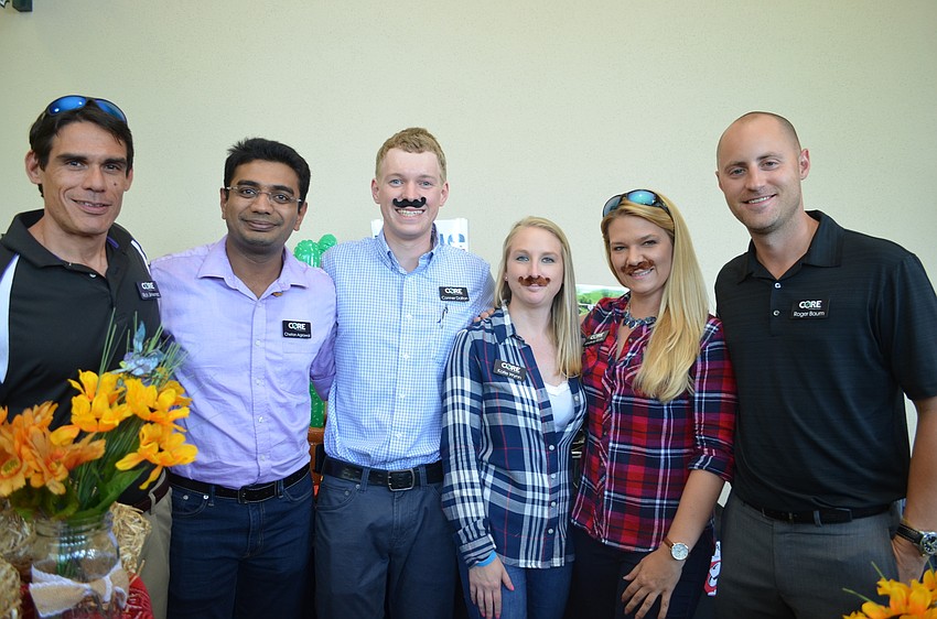 Rick Jimenez, Chetan Agrawal, Conner Dalton, Katie Wynn, Lindsay Roth and Roger Baum from CORE with a taste of Texas.