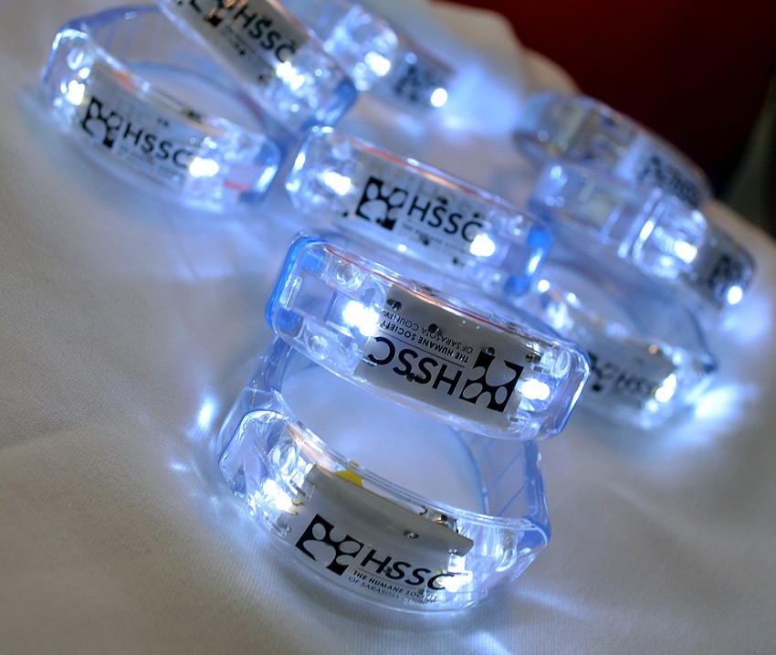 Guests purchased light up bracelets for $100 donations to be entered in a raffle.