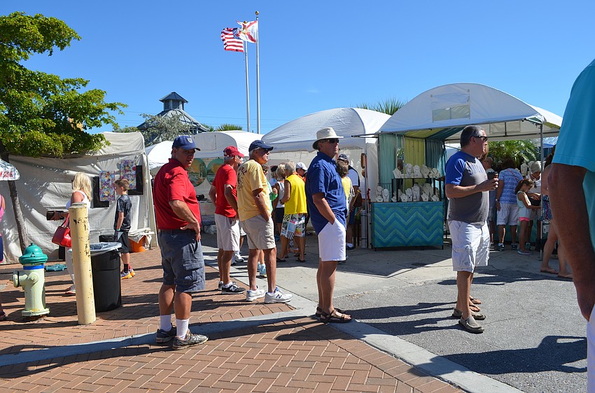 Booths surround the gazebo near the intersection of Ocean Boulevard and Canal Road.