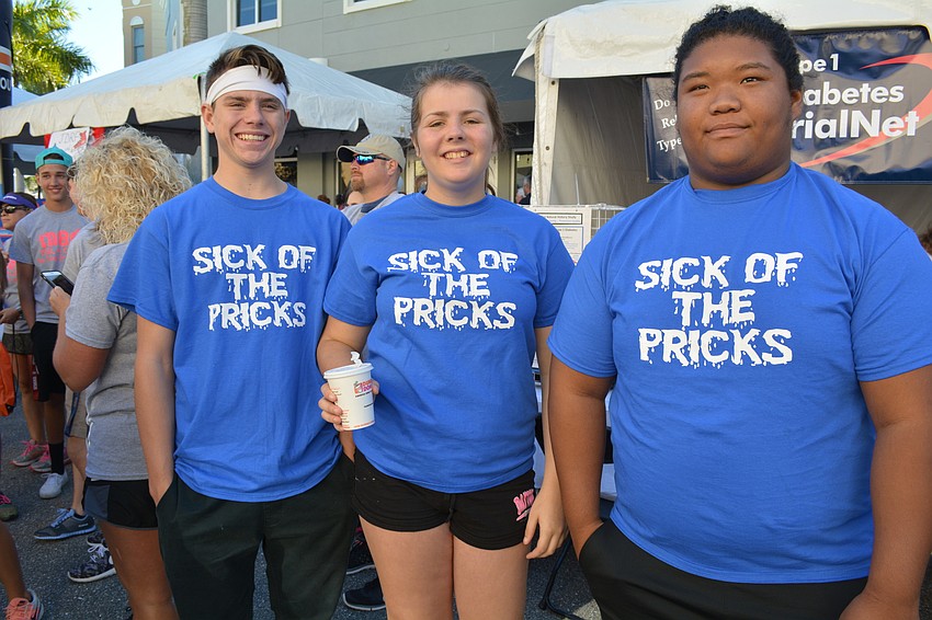 Erasmus Reitinger, Amber Leonard and Eddie Tanner came all the way from Plant City to walk with their friend, Emily Conrad, who has diabetes.
