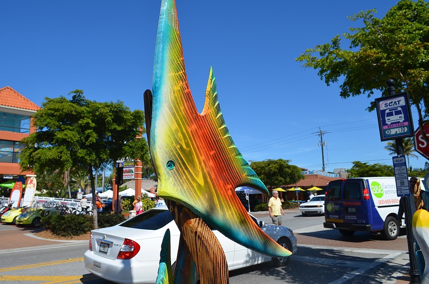 One of the many wooden sculptures on display by Steve Umphrey.