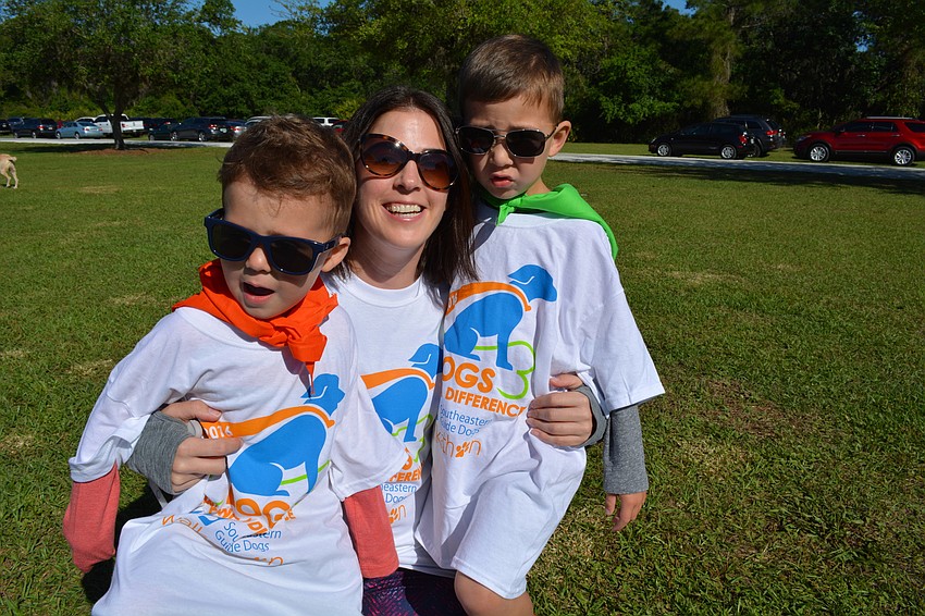 Eli, Bree and Miles Meredith, of Sarasota, attend.