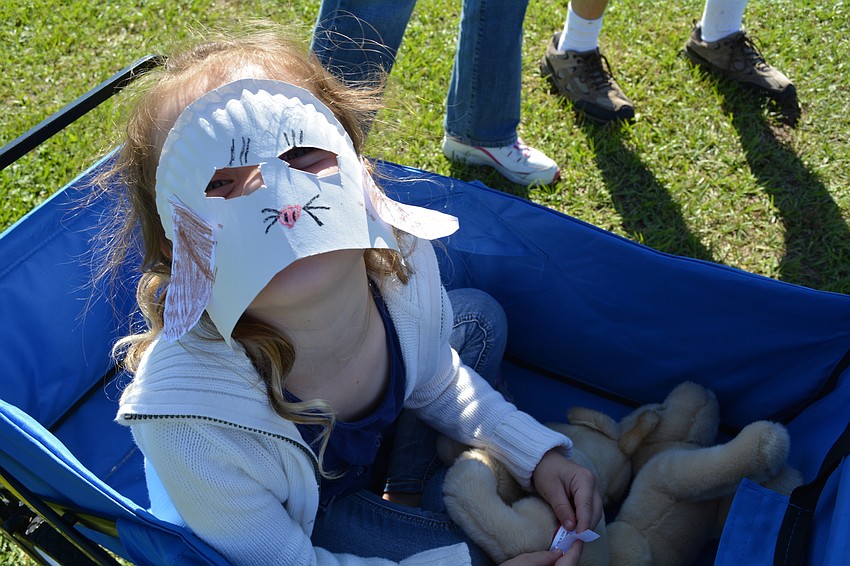 Hannah Bryan, of Parrish, sports a dog mask she made.
