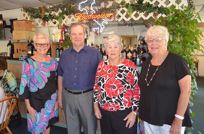 Incoming co-President Mary Baker, author Terry Griffin, outgoing President Eileen Hassel and outgoing co-President Hazel Steskal
