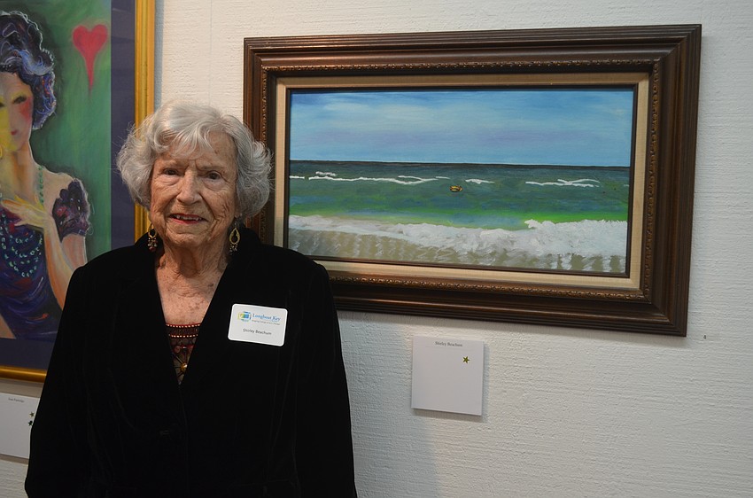 Artist Shirley Beachum with “Baron Floating on Whitney Beach”