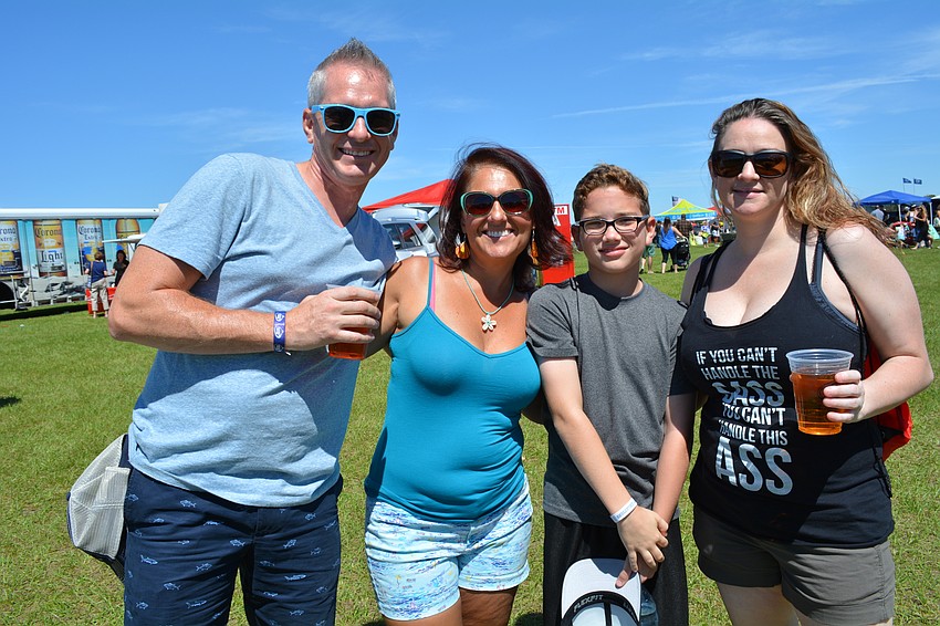 Sarasota's Jarrad Truax, with his wife, Laura, spends time with his nephew and sister, Gabriel and Melissa Truax.