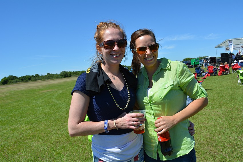 Lauren Szelewicki, of Chicago, attends with her friend Kaitlyn Strecker, of Bradenton.
