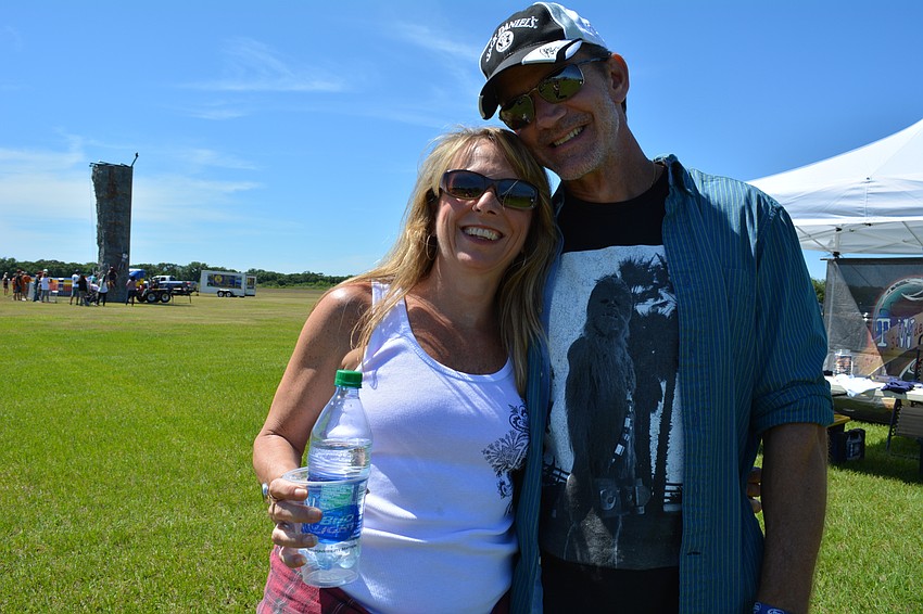 Bonnie and Jarrett Higgins watch the band, Twinkle, perform. Jarrett Higgins performed with the festival's first band of the day, ShoreDogs.