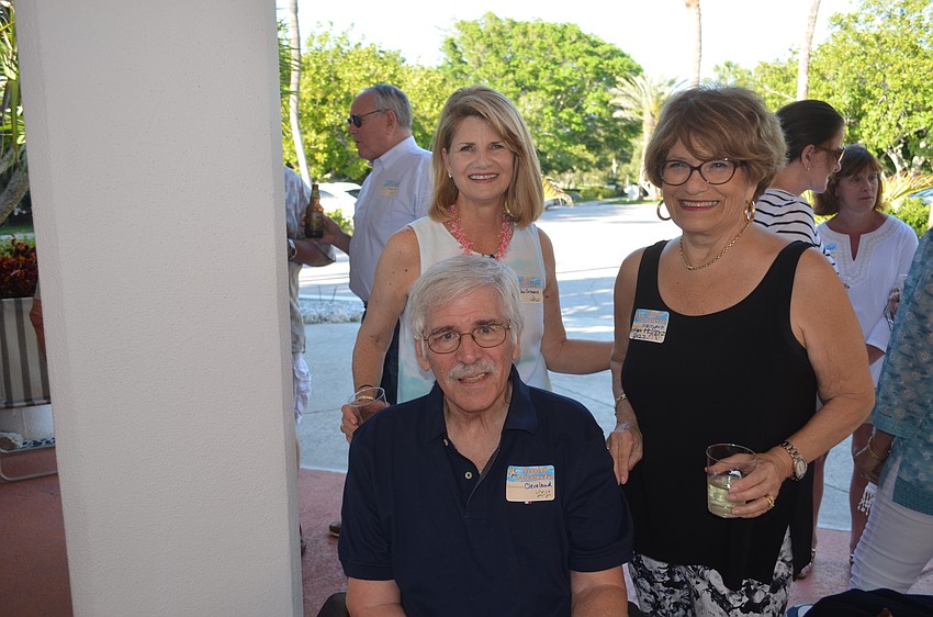 Julie Flaherty, left, with Stanley and Cheryl Greene