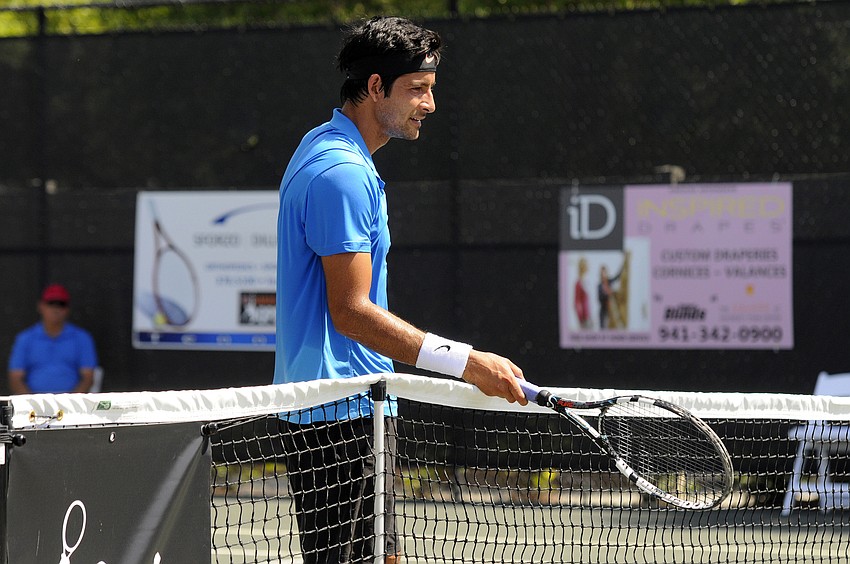 Marcelo Arevalo awaits to see whether or not the ball landed out of play.