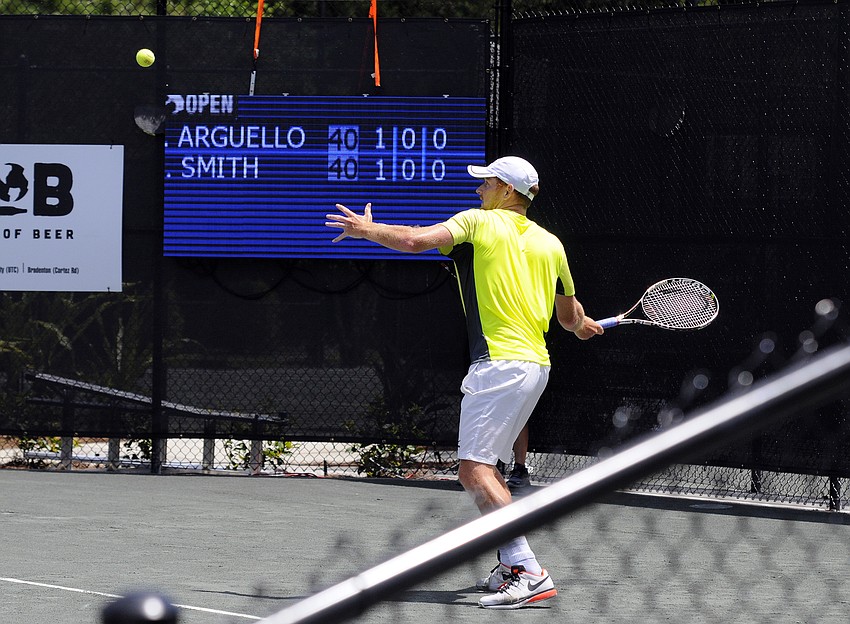 American Connor Smith sends the ball back over the net during his opening match of the 2016 White Sands Realty/Joey Gratton Sarasota Open April 11.