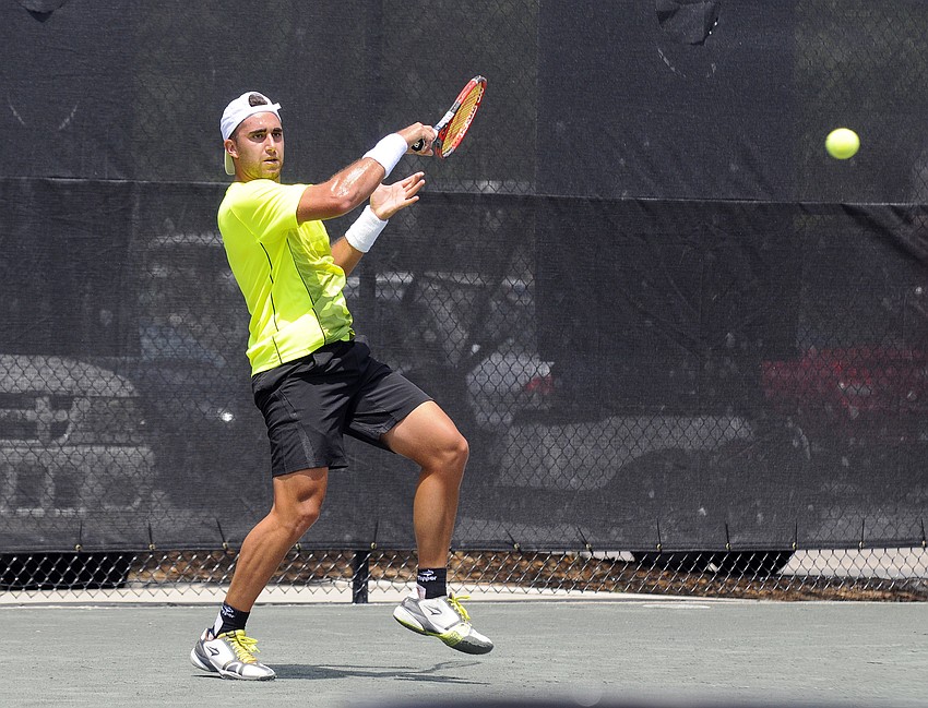 Argentina's Facundo Arguello returns a serve during his first-round match versus American Connor Smith.