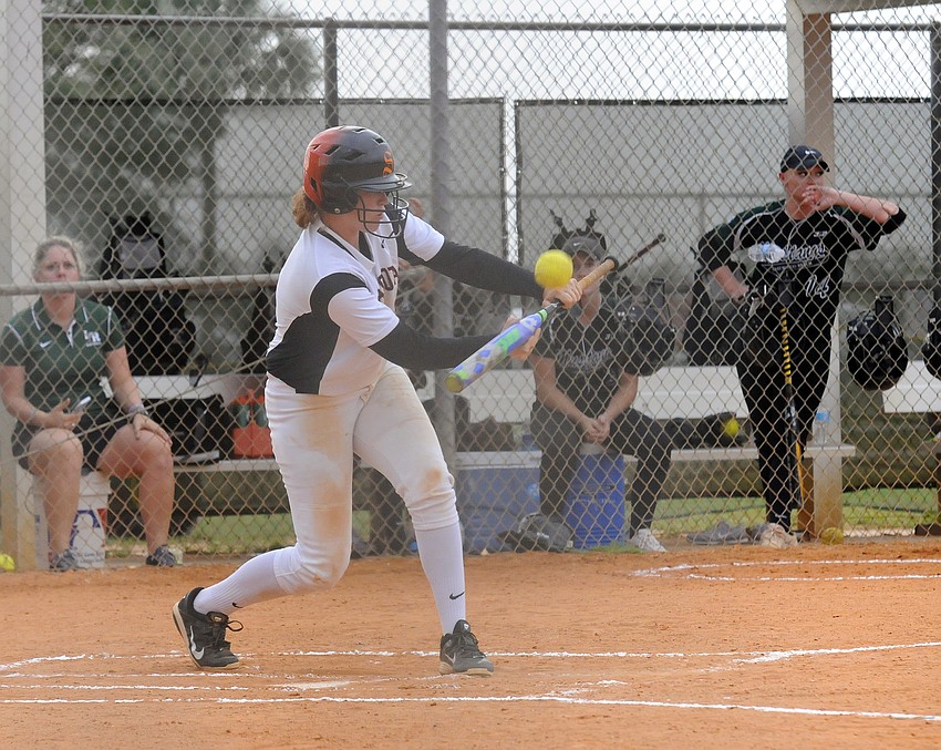 Sarasota senior SarahBeth Wengerd puts down a bunt in the first inning.
