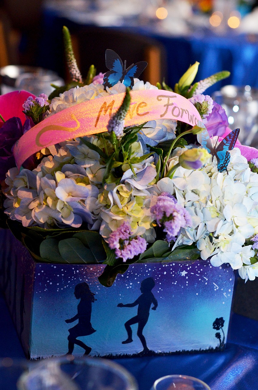 The ballroom was decorated with blues and butterflies for CPC's annual fundraising gala.