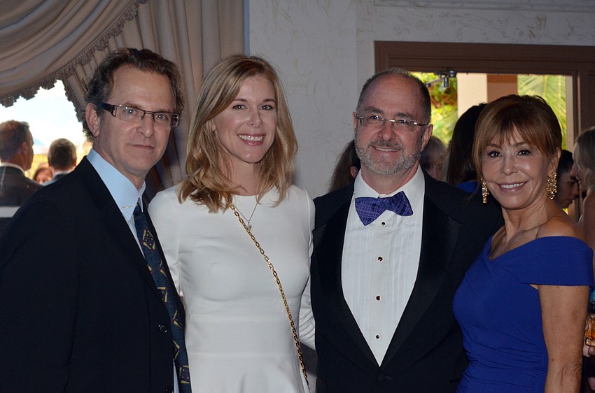 Dr. Jonathan and Hilary Yunis with Dr. Kirk and Chris Voelker