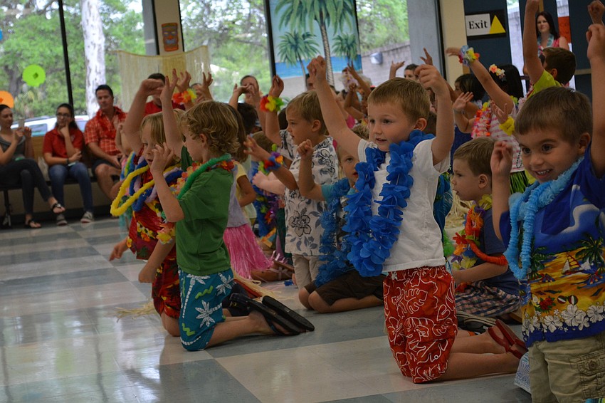 Children in Tara's voluntary pre-kindergarten program perform a Hawaiian-inspire dance.