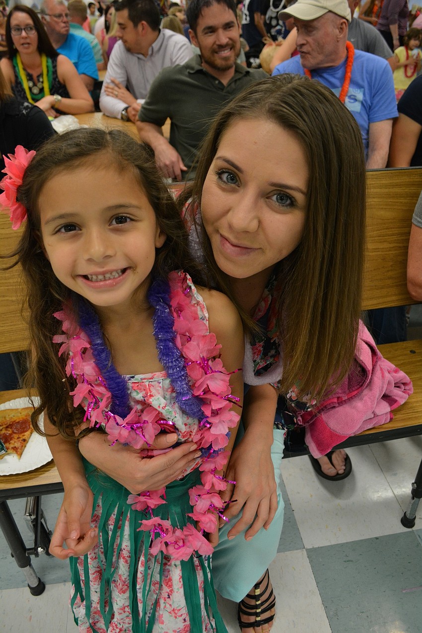 Abigail and Raquel Guttierez attend their first luau.