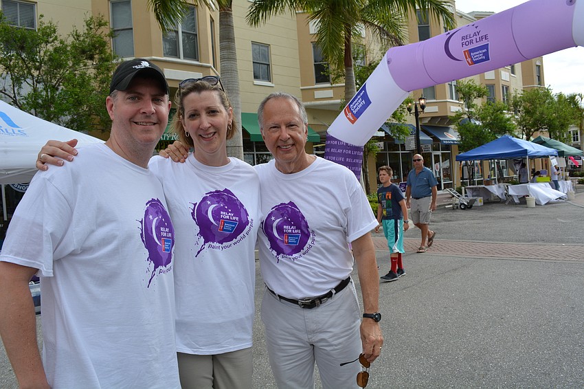 Country Meadows resident Matt Owens walks with Teri and Dan Callender, all on the Ritz Carlton's team.