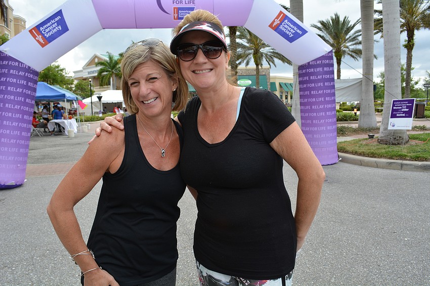 East County's Marci Walker and Mary Searles walk with the Sports Nation team.AC