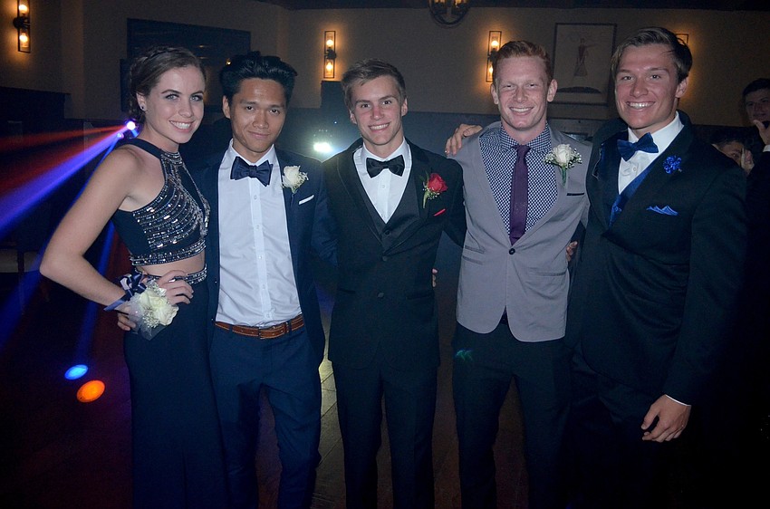 Carling Landede, Nam Hoang, Michael Donato, Todd Humphrey and McCabe Ballance show off their prom wear.