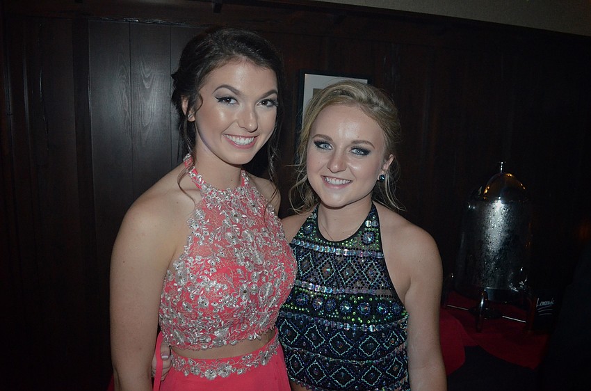 Greta Holland and Lacey Eaden attend prom with friends.