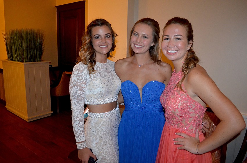 Sasha Brun-Wibaux, Maria Ross and Savannah Alario show off their dresses.
