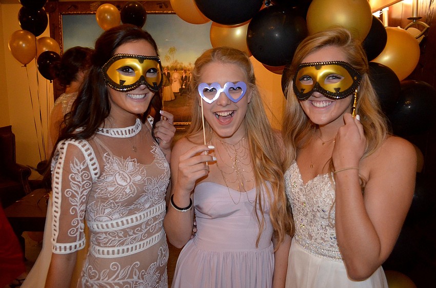 Peyton Vaughn, Hanna Colenan and Charlotte Dixon play with props.