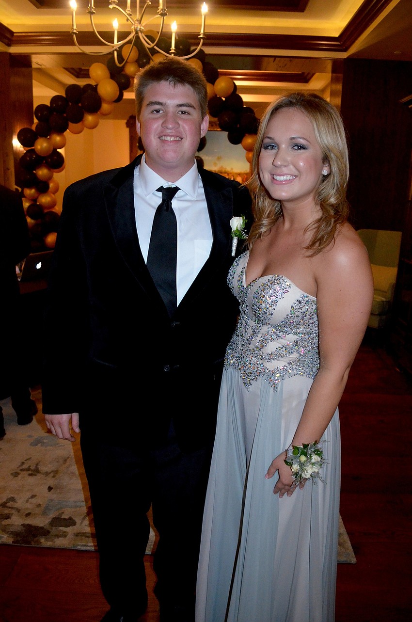 Jon Eichenbaum and Lauren Redington make their way to the dance floor.