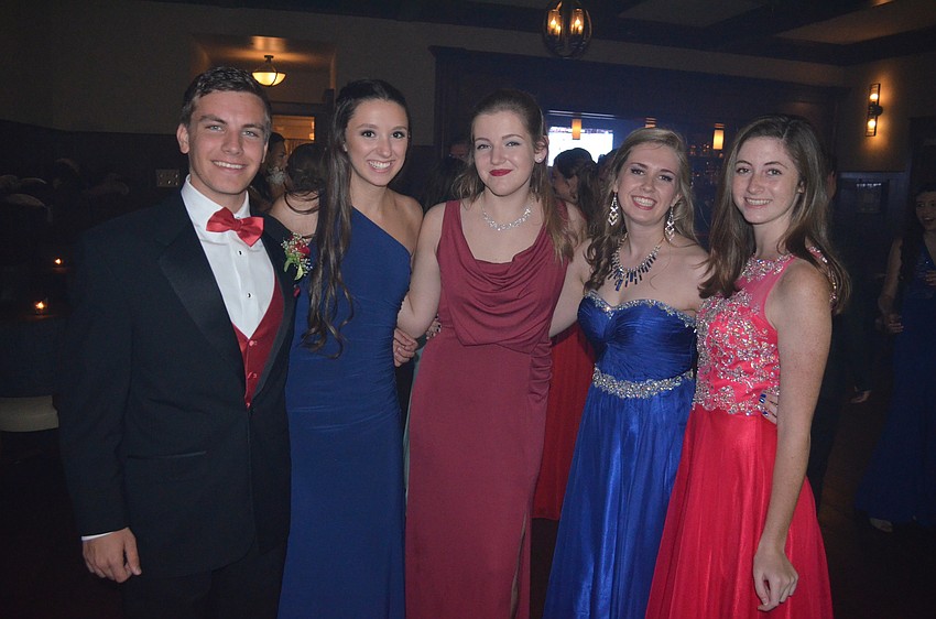 Garrett Luhman, Sydney Koffman, Chloe Militzer, Amber Bond and Izzy Eichenbaum attend the dance with friends and dates.