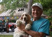 Ken Molnar dances with his pup Sara